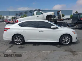 2013 Nissan Sentra SR z VIN 3N1AB7AP7DL776088, wystawiony jako IAAI lot #42484496 z przebiegiem 96 999 mil mil oraz . Historia ofert i sprzedaży dostępna na DreamBid. Obrazek 13.