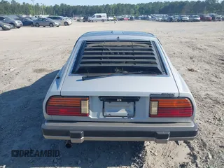 1983 Datsun 280ZX z VIN JN1HZ04S3DX562060, wystawiony jako IAAI lot #42063701 z przebiegiem 35 754 mil mil oraz . Historia ofert i sprzedaży dostępna na DreamBid. Obrazek 16.