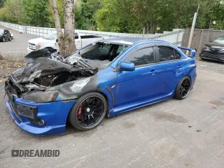 2008 Mitsubishi Lancer Evolution GSR with VIN JA3AW86VX8U044188, listed as a Copart auction lot 70872314 with 0 mi miles and Salvage Title. Bid and sale history available at carsss.com. Image 1.