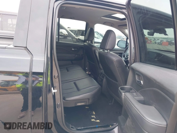 2022 Honda Ridgeline RTL-E with VIN 5FPYK3F75NB020036, listed as a IAAI auction lot 41500206 with 79,655 mi miles and . Bid and sale history available at DreamBid. Image 8.