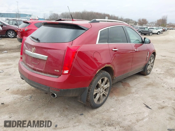2012 Cadillac SRX Performance Collection with VIN 3GYFNEE36CS555764, listed as a IAAI auction lot 41813873 with 162,680 mi miles. Bid and sale history available at carsss.com. Image 4.