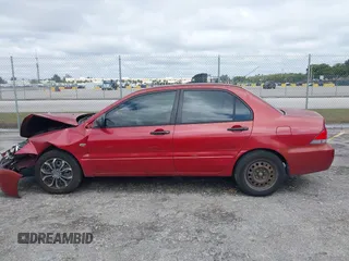 2006 Mitsubishi Lancer ES with VIN JA3AJ26E66U057223, listed as a IAAI auction lot 41665991 with 165,359 mi miles. Bid and sale history available at carsss.com. Image 14.