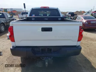 2019 Toyota Tundra SR with VIN 5TFRM5F15KX135882, listed as a IAAI auction lot 41681903 with 253,675 mi miles and . Bid and sale history available at DreamBid. Image 16.