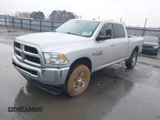 2018 Ram 2500 SLT with VIN 3C6UR5DL4JG183707, listed as a IAAI auction lot 41537848 with 233,281 mi miles and . Bid and sale history available at DreamBid. Image 2.