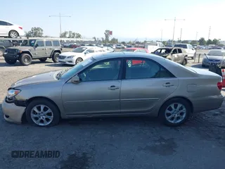 2005 Toyota Camry LE with VIN 4T1BF32K55U592479, listed as a IAAI auction lot 41974250 with 184,767 mi miles and . Bid and sale history available at DreamBid. Image 14.