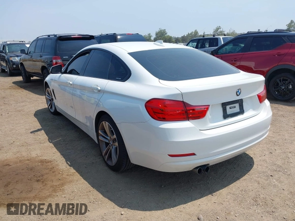 2015 BMW 4 Series 428i with VIN WBA4A9C57FGL86164, listed as a IAAI auction lot 42629769 with 123,984 mi miles and . Bid and sale history available at DreamBid. Image 3.