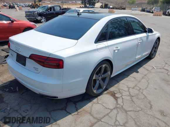 2017 Audi A8 Sport with VIN WAU43AFD3HN010445, listed as a IAAI auction lot 42714864 with 106,748 mi miles and . Bid and sale history available at DreamBid. Image 4.