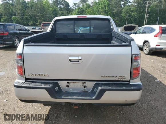 2014 Honda Ridgeline RTL with VIN 5FPYK1F58EB012869, listed as a Copart auction lot 51854995 with 318,950 mi miles and Salvage title. Bid and sale history available at DreamBid. Image 6.