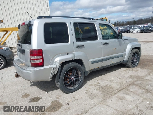 2009 Jeep Liberty Sport with VIN 1J8GN28K39W520228, listed as a IAAI auction lot 41961381 with 196,187 mi miles. Bid and sale history available at carsss.com. Image 4.