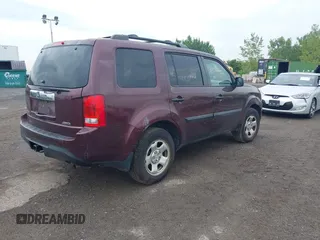 2013 Honda Pilot LX with VIN 5FNYF4H25DB029032, listed as a IAAI auction lot 42661736 with 128,096 mi miles and . Bid and sale history available at DreamBid. Image 4.