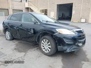 2010 Mazda CX-9 Grand Touring with VIN JM3TB2MV1A0203416, listed as a IAAI auction lot 42090500 with 131,659 mi miles and . Bid and sale history available at carsss.com. Image 1.