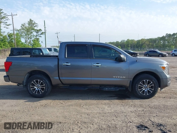 2021 Nissan Titan Pro-4X with VIN 1N6AA1ED0MN518084, listed as a IAAI auction lot 42147230 with 41,496 mi miles and . Bid and sale history available at DreamBid. Image 13.
