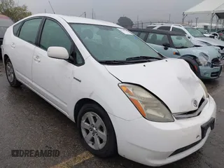 2007 Toyota Prius z VIN JTDKB20U177622142, wystawiony jako IAAI lot #41720920 z przebiegiem 140 665 mil mil oraz . Historia ofert i sprzedaży dostępna na DreamBid. Obrazek 1.