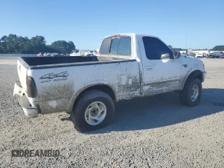 1998 Ford F-150 with VIN 1FTZF18W3WNB98041, listed as a Copart auction lot 77530824 with 194,712 mi miles and Salvage title. Bid and sale history available at DreamBid. Image 3.