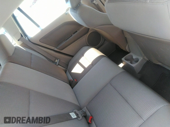 2009 Dodge Caliber SXT with VIN 1B3HB48A19D259105, listed as a IAAI auction lot 41881974 with 127,096 mi miles and . Bid and sale history available at DreamBid. Image 8.