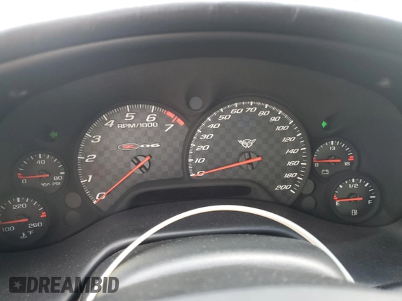 2002 Chevrolet Corvette Z06 z VIN 1G1YY12S725106363, wystawiony jako Copart lot #74213194 z przebiegiem Nie podano mil oraz Nie do naprawy. Historia ofert i sprzedaży dostępna na DreamBid. Obrazek 9.