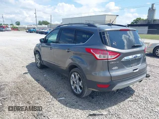 2013 Ford Escape SEL with VIN 1FMCU0HXXDUD51754, listed as a IAAI auction lot 42696434 with 145,705 mi miles and . Bid and sale history available at DreamBid. Image 3.