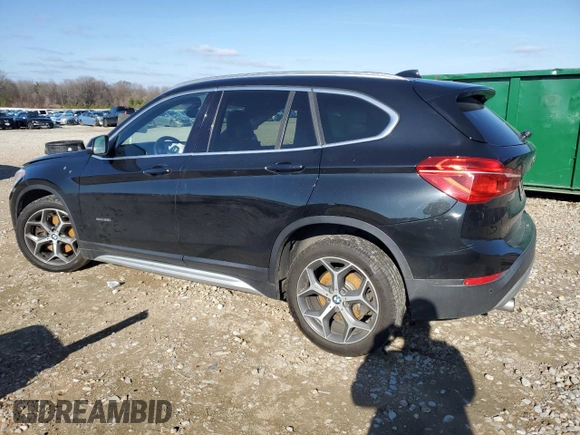 2017 BMW X1 xDrive28i with VIN WBXHT3C35H5F68640, listed as a Copart auction lot 85563114 with 103,480 mi miles and Salvage Title. Bid and sale history available at carsss.com. Image 2.