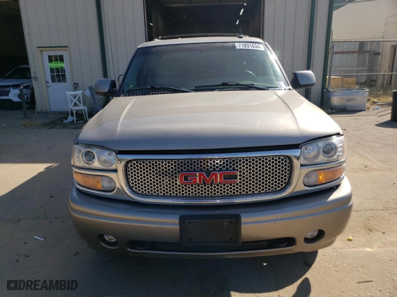 2002 GMC Yukon Denali with VIN 1GKEK63U72J274220, listed as a Copart auction lot 71891634 with 140,885 mi miles and Salvage Title. Bid and sale history available at carsss.com. Image 5.