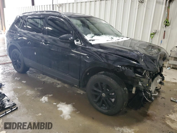 2023 Volkswagen Tiguan S with VIN 3VVFB7AX9PM058545, listed as a Copart auction lot 87412544 with 3,902 mi miles and Salvage title. Bid and sale history available at DreamBid. Image 4.