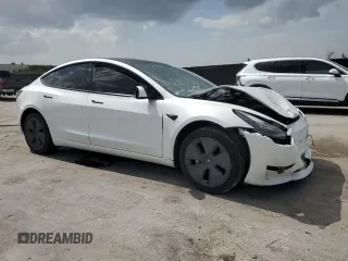 2023 Tesla Model 3 with VIN 5YJ3E1EA8PF499535, listed as a Copart auction lot 59974115 with 18,365 mi miles and Salvage title. Bid and sale history available at DreamBid. Image 4.