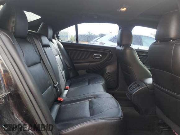 2014 Ford Taurus Limited z VIN 1FAHP2J88EG177883, wystawiony jako Copart lot #56119255 z przebiegiem 141 743 mil mil oraz Szkoda całkowita • Salvage title. Historia ofert i sprzedaży dostępna na DreamBid. Obrazek 10.