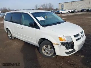 2009 Dodge Grand Caravan SE with VIN 2D8HN44E39R532669, listed as a IAAI auction lot 41800496 with 216,744 mi miles. Bid and sale history available at carsss.com. Image 1.