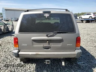 2000 Jeep Cherokee z VIN 1J4FF48S9YL220831, wystawiony jako Copart lot #54304615 z przebiegiem Nie podano mil oraz Szkoda całkowita • Salvage title. Historia ofert i sprzedaży dostępna na DreamBid. Obrazek 6.