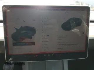 2024 Tesla Model Y z VIN 7SAYGDED2RA329802, wystawiony jako Copart lot #57748805 z przebiegiem 19 391 mil mil oraz Szkoda całkowita • Salvage title. Historia ofert i sprzedaży dostępna na DreamBid. Obrazek 9.