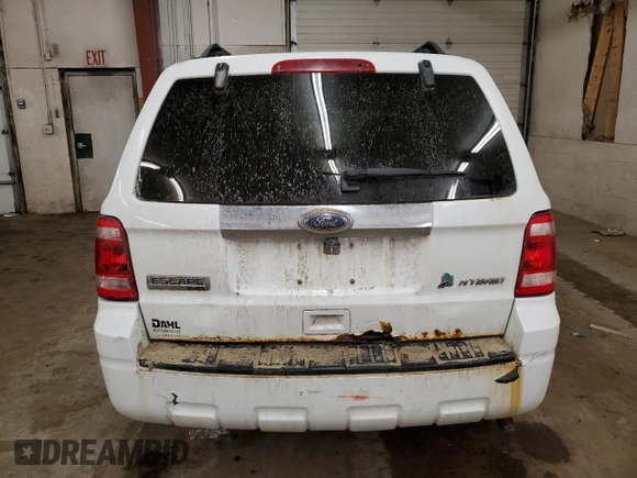 2012 Ford Escape Hybrid z VIN 1FMCU5K32CKB20604, wystawiony jako Copart lot #86421304 z przebiegiem 188 249 mil mil oraz Szkoda całkowita • Salvage title. Historia ofert i sprzedaży dostępna na DreamBid. Obrazek 6.