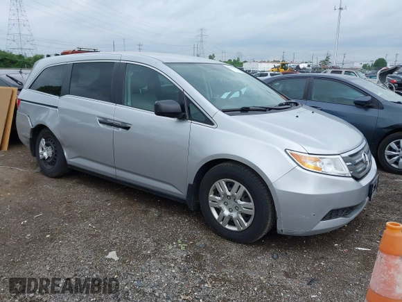 2011 Honda Odyssey LX with VIN 5FNRL5H25BB040287, listed as a IAAI auction lot 42456679 with 129,176 mi miles and . Bid and sale history available at DreamBid. Image 1.