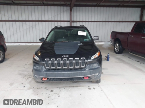 2014 Jeep Cherokee Trailhawk with VIN 1C4PJMBS3EW150366, listed as a IAAI auction lot 41971035 with 90,994 mi miles. Bid and sale history available at carsss.com. Image 11.