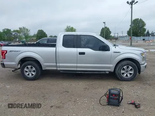 2015 Ford F-150 XL with VIN 1FTEX1C8XFKD19587, listed as a IAAI auction lot 42315673 with 220,319 mi miles and . Bid and sale history available at DreamBid. Image 13.