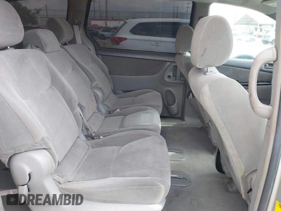 2004 Toyota Sienna CE with VIN 5TDZA23C04S032956, listed as a IAAI auction lot 42121153 with 218,908 mi miles. Bid and sale history available at carsss.com. Image 8.