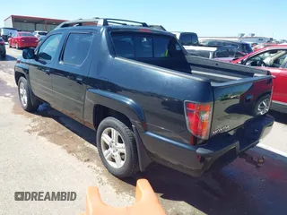2013 Honda Ridgeline RTL with VIN 5FPYK1F57DB005538, listed as a IAAI auction lot 41985586 with 152,697 mi miles and . Bid and sale history available at DreamBid. Image 3.