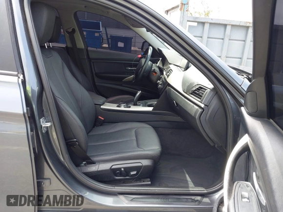 2014 BMW 3 Series 320i xDrive with VIN WBA3C3C58EP661414, listed as a IAAI auction lot 42489010 with 93,488 mi miles and . Bid and sale history available at DreamBid. Image 5.