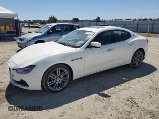 2014 Maserati Ghibli with VIN ZAM57XSA5E1083907, listed as a Copart auction lot 65812175 with 59,625 mi miles and Salvage title. Bid and sale history available at DreamBid. Image 1.
