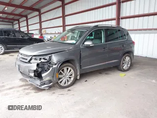 2016 Volkswagen Tiguan SE with VIN WVGBV7AX7GW526904, listed as a IAAI auction lot 42590816 with 73,758 mi miles and . Bid and sale history available at DreamBid. Image 2.