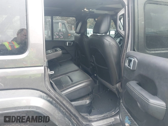 2021 Jeep Wrangler Unlimited Sahara z VIN 1C4JJXP68MW745098, wystawiony jako IAAI lot #41461092 z przebiegiem 36 410 mil mil oraz . Historia ofert i sprzedaży dostępna na DreamBid. Obrazek 8.