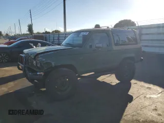 1989 Ford Bronco z VIN 1FMCU12T4KUC50332, wystawiony jako Copart lot #44782195 z przebiegiem 161 295 mil mil oraz Szkoda całkowita • Salvage title. Historia ofert i sprzedaży dostępna na DreamBid. Obrazek 1.