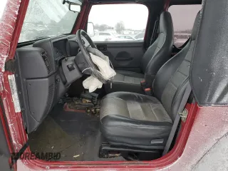 1999 Jeep Wrangler SE with VIN 1J4FY29P3XP470646, listed as a Copart auction lot 89298855 with 81,890 mi miles and Salvage Title. Bid and sale history available at carsss.com. Image 7.
