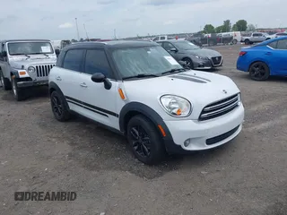 2015 MINI Countryman with VIN WMWZB3C59FWR43968, listed as a IAAI auction lot 42060058 with 88,754 mi miles and . Bid and sale history available at DreamBid. Image 1.