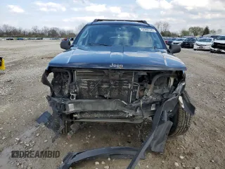 2004 Jeep Grand Cherokee Laredo with VIN 1J4GW48S84C184757, listed as a Copart auction lot 52895745 with 242,307 mi miles and Salvage Title. Bid and sale history available at carsss.com. Image 5.