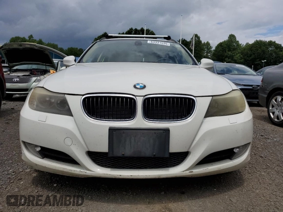 2011 BMW 3 Series 328i xDrive with VIN WBAUU3C5XBA542974, listed as a Copart auction lot 63331535 with 276,912 mi miles and Salvage title. Bid and sale history available at DreamBid. Image 5.
