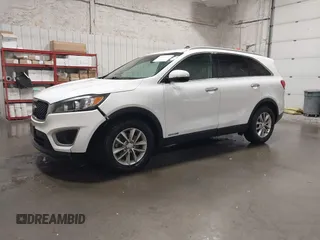 2016 Kia Sorento LX with VIN 5XYPGDA51GG047781, listed as a IAAI auction lot 42137935 with 103,386 mi miles. Bid and sale history available at carsss.com. Image 2.
