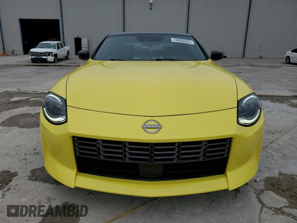2023 Nissan Z Sport с VIN JN1BZ4AH0PM310987, выставлен на аукционе Copart как лот 74926264 с пробегом 10 474 миль миль и Списание • Salvage title. История ставок и продаж доступна на DreamBid. Изображение 5.