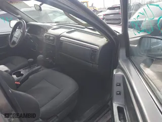 2002 Jeep Grand Cherokee Laredo with VIN 1J4GW48N12C193792, listed as a IAAI auction lot 41545283 with 166,720 mi miles. Bid and sale history available at carsss.com. Image 5.