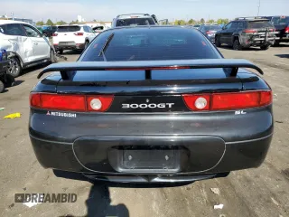 1995 Mitsubishi 3000GT z VIN JA3AM54J6SY013766, wystawiony jako Copart lot #75465424 z przebiegiem 103 869 mil mil oraz Szkoda całkowita • Salvage title. Historia ofert i sprzedaży dostępna na DreamBid. Obrazek 6.