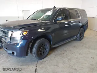 2017 Chevrolet Tahoe Commercial with VIN 1GNLCDECXHR228908, listed as a IAAI auction lot 41537030 with 114,725 mi miles. Bid and sale history available at carsss.com. Image 17.