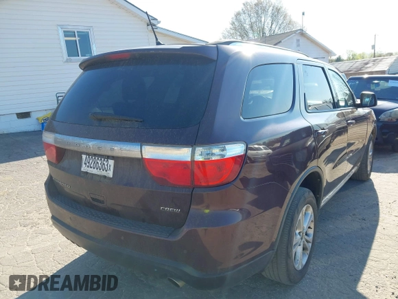 2012 Dodge Durango Crew with VIN 1C4RDHDG9CC330644, listed as a IAAI auction lot 41889758 with 194,295 mi miles and . Bid and sale history available at DreamBid. Image 4.